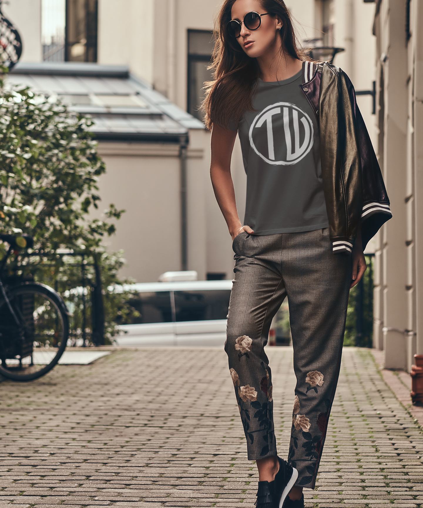 mockup-of-a-woman-walking-on-a-street-with-a-round-neck-t-shirt-42036-r-el2.png